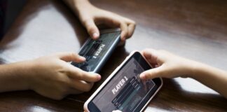 Download COD Mobile Season 9 APK and OBB for Android Little boy playing a mobile game against his sister